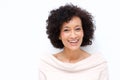 Close up attractive middle age african american woman smiling against white background Royalty Free Stock Photo