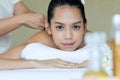 Close up of attractive young Asian woman smiling during getting Spa Royalty Free Stock Photo