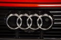 Close up of the Audi car brand logo on dark background