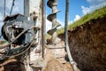 Close up of auger, industrial drilling rig making a hole