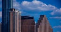 Close up on Austin Texas Office building Historic Skyline With New Austonian and Perfect Clouds and Blue sky