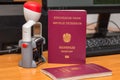 Close-up of Austrian biometric passport with a date stamper, interstate border in Europe. Inscription - European Union, Republic