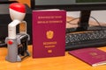 Close-up of Austrian biometric passport with a date stamper, interstate border in Europe. Inscription - European Union, Republic