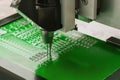 Close-up. Automated production of computer boards. Royalty Free Stock Photo
