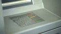 Close up of automated teller machine, buttons on ATM, secure money withdrawing