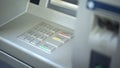 Close-up of automated teller machine, buttons on ATM, secure money withdrawing