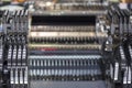 Close up automatic component feed unit of PCB LED SMT pick and place machine feeder for assembly electronic board Royalty Free Stock Photo