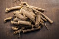 Close up of Ayurvedic herb Liquorice root,Licorice root, Mulethi or Glycyrrhiza glabra root on a wooden surface is very much benef