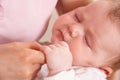 Close Up Of Baby Boy Holding Mothers Hand Royalty Free Stock Photo