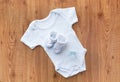 Close up of baby boys clothes for newborn on table Royalty Free Stock Photo