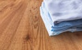 Close up of baby boys clothes for newborn on table Royalty Free Stock Photo