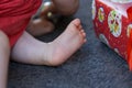 Close up of a baby foot on Christmas morning