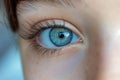 Close up baby girl eye photo. Caucasian kid child girl eye macro nature beauty blue color iris and brown hair. Look to Royalty Free Stock Photo