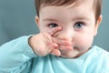 Close up of a baby girl looking at camera with a big blue eyes Royalty Free Stock Photo