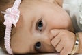 Close up of Baby Girl Sucking Thumb Royalty Free Stock Photo