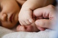 Close up baby hand catch mom finger Royalty Free Stock Photo