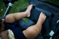 Sweet little boy sleeping in a stroller Royalty Free Stock Photo