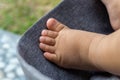 Close up of baby tini feet. baby foot on stroller. Infant boy tiny feet Royalty Free Stock Photo