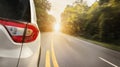 Close up back of car is running on asphalt road in summer Royalty Free Stock Photo