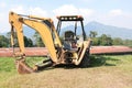 Close up of a Back Hoe at the side of a hill Royalty Free Stock Photo