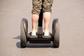 Close up back human on Airwheel Electric Unicycle in the road