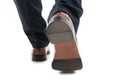 Close-up of back view business man elegant shoes walking Royalty Free Stock Photo