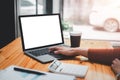 Close-up back view of a business woman working in the office typing, Royalty Free Stock Photo