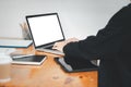 Close-up back view of a business woman working in the office typing, Royalty Free Stock Photo