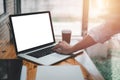 Close-up back view of a business woman working in the office typing, looking at the screen. Royalty Free Stock Photo