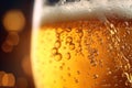 Close up background of beer with bubbles in glass. Pouring beer with bubble froth in glass for background on front view wave curve