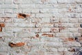 Close up background of brick wall, different shape adobe, horizontal rough abstract shabby old worn surface texture Royalty Free Stock Photo