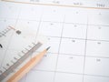 Close up the background of a calendar page, with a pencil and ruler Royalty Free Stock Photo