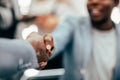 Close up. background image of a handshake of young entrepreneurs