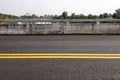 Close-up background of a new asphalt road surface with yellow stripes Royalty Free Stock Photo