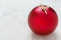 Close up background of one perfect big red Christmas ornament on white background horizontal with empty blank copy space