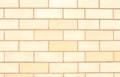 Close-up of a background of rectangles of pale yellow bricks