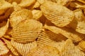 Close up backgroundof heap of tasty potato chips