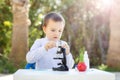 Close-up background view of a cute boy Who are experimenting to learn scientific processes at home, learning outside the classroom Royalty Free Stock Photo
