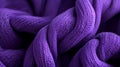 A close-up background of violet yarn textile fabric features a lovely wavy or crumpled pattern. The wool fabric texture Royalty Free Stock Photo