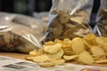 close-up of bagged potatoes chips, with view of product and price visible