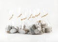 Close up bags of coins on white background for financial and saving artwork Royalty Free Stock Photo