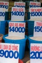 Close up of bags of rice in a local market in Vietnam with price Royalty Free Stock Photo