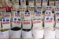 Close up of bags of rice in a local market in Vietnam with price Royalty Free Stock Photo