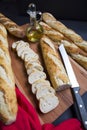 Close-Up Of Baguettes on cutting board with knife Royalty Free Stock Photo