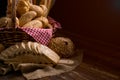 Close up of Baked Bread with basket on black background