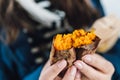 Close up Baked Sweet Potato with peel in hands, hot and sweet Royalty Free Stock Photo