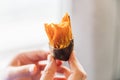 Close up Baked Sweet Potato with peel in hands, hot and sweet in Taiwan, Taipei Royalty Free Stock Photo