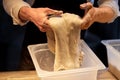 Close up of baker hands making bread dough Royalty Free Stock Photo