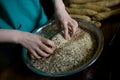 Close-up. Baker makes baked goods, shapes dough on the desktop