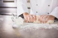 Close up of baker preparing dough Royalty Free Stock Photo